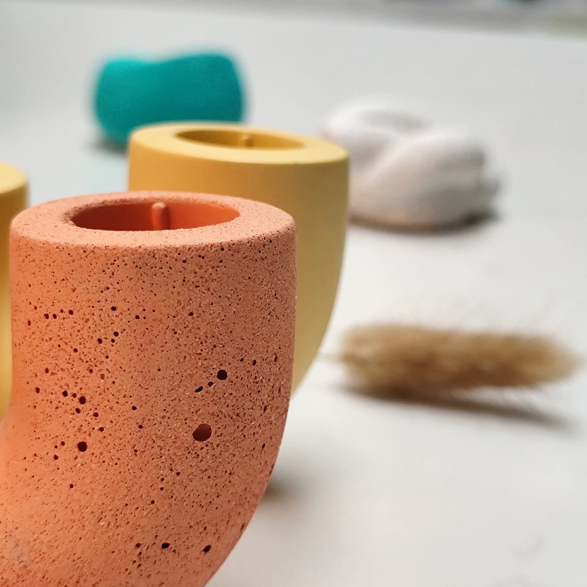 close up of Handmade candle holder, showing the rough surface