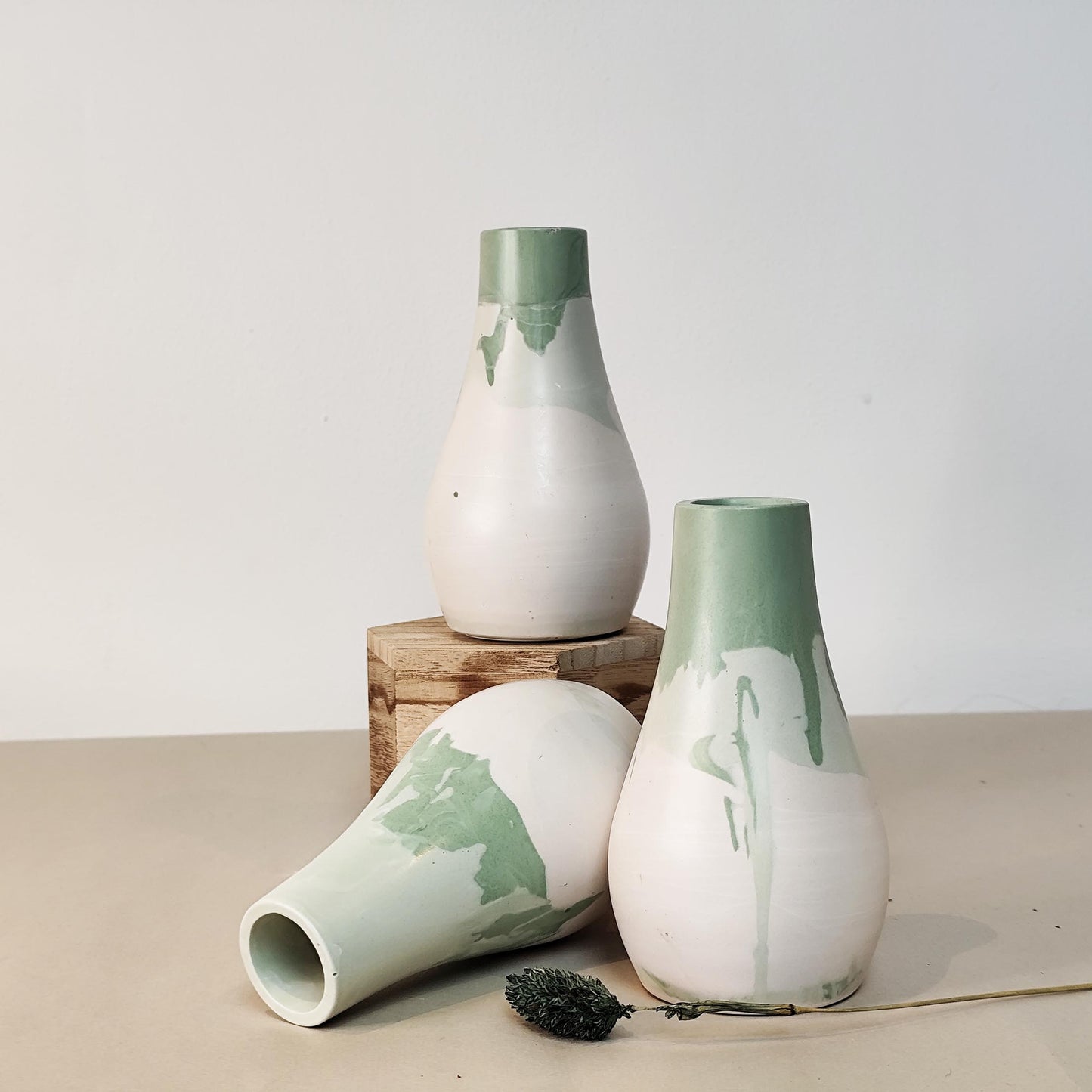 Handmade Luna Jesmonite vase displayed on shelf in contemporary neutral home decor